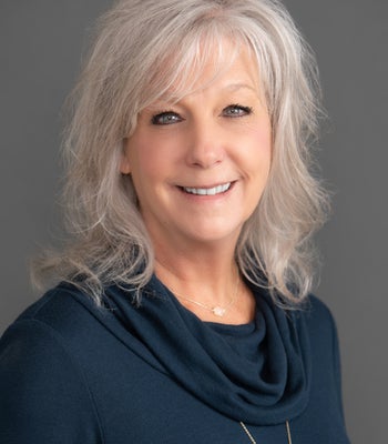 Portrait of Janet Johnson, REALTOR®.